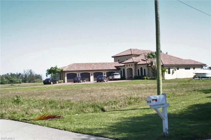 ACROSS THE STREET AND OVER TWO LOTS, HOUSE IS ON SPREADER CANAL !!!