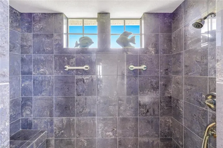 Bathroom with a tile shower