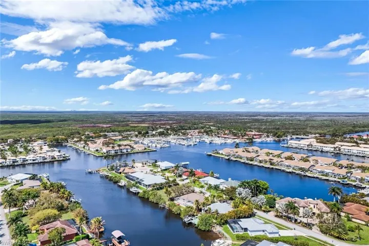Aerial view of residential area with a large body of water