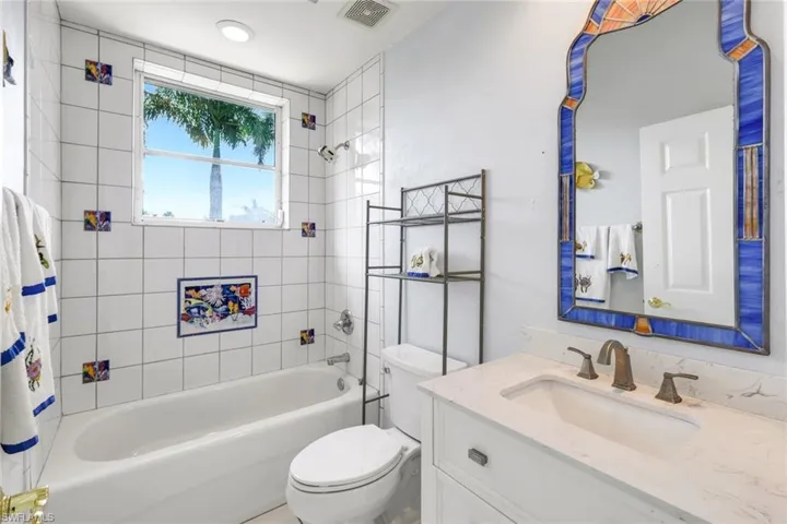 Full bathroom featuring vanity and shower / tub combo