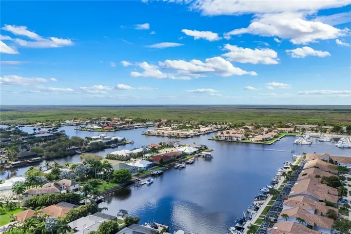 Aerial view of residential area with a nearby body of water