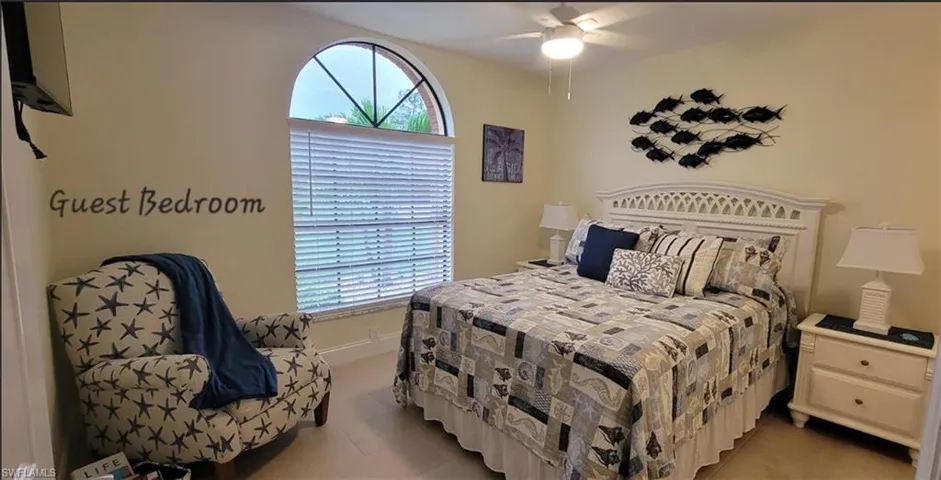 Bedroom featuring ceiling fan, All NEW tile