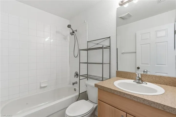 Full bathroom with vanity and  shower combination