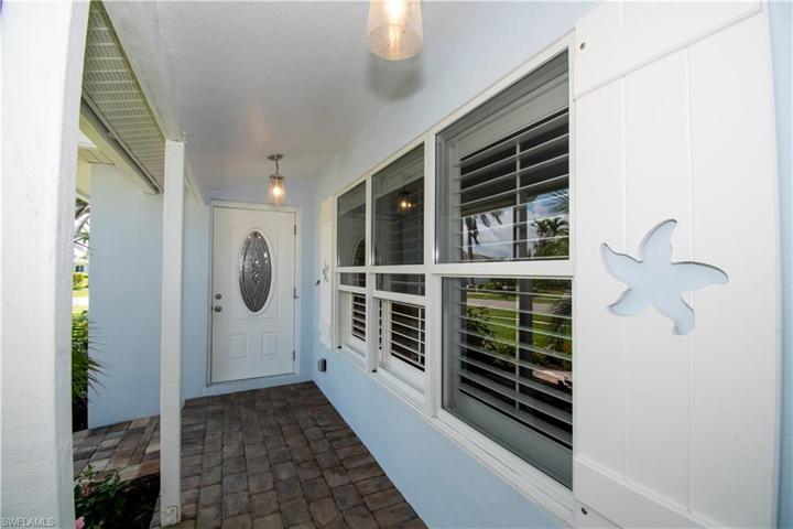 Custom "starfish" shutters adorne the home