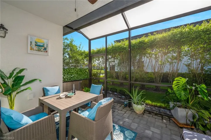 Screened lanai with partial lake views