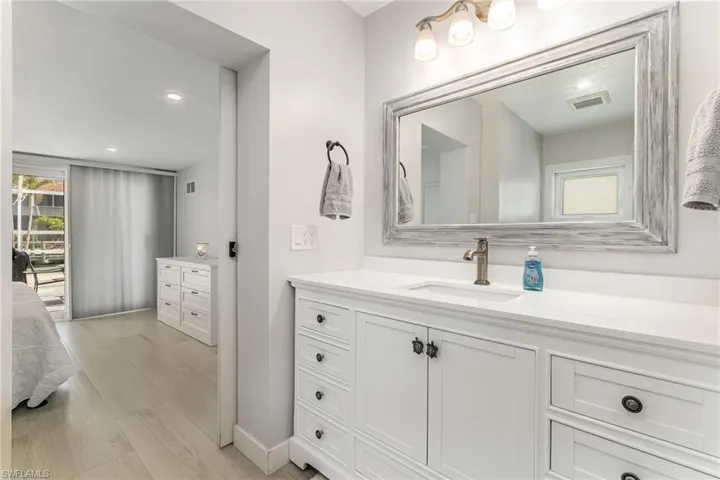 Primary Bathroom with furniture style vanity