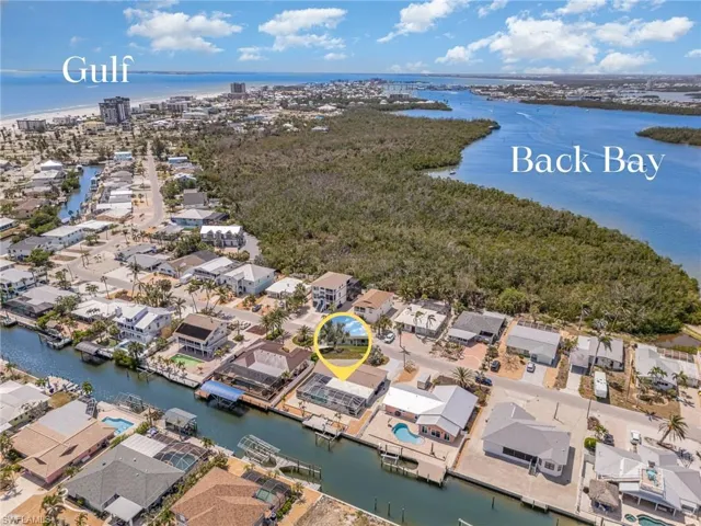 Aerial view of residential area featuring location to Back Bay & Gulf of Mexico