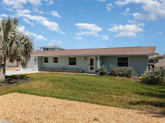 Ranch-style house featuring an attached garage