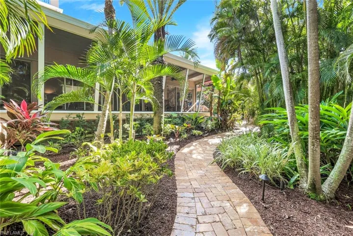 Lush side yard path to pool area