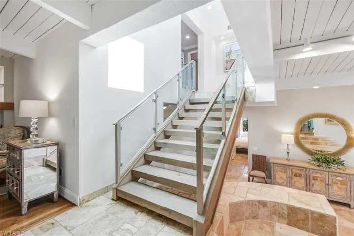 Custom built staircase to the second floor guest room area
