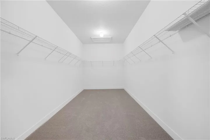 Large walk in closet in primary bedroom