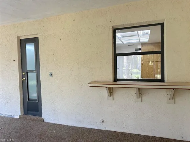 Great lanai with door to guest bath and pass-through window to kitchen. Wonderful for outdoor entertaining!