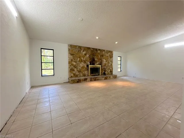 Extra large real wood-burning fireplace.