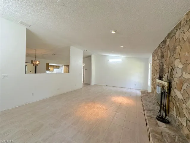 Removing non-bearing wall would open space up even more!