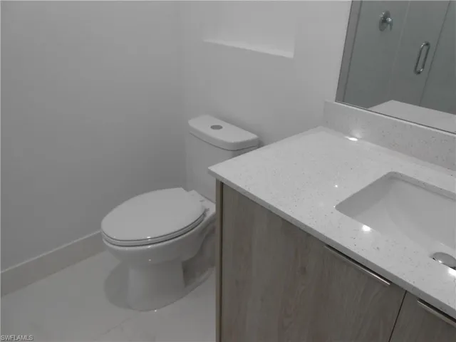Bathroom featuring toilet and vanity
