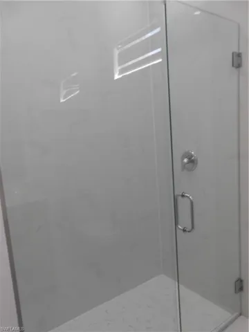 Detailed view of a marble finish shower