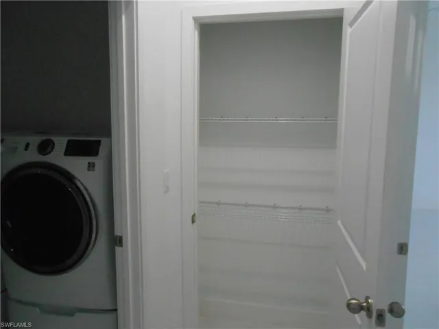 Laundry area with washer / dryer