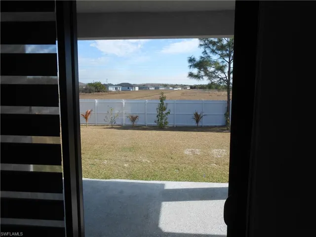 Water view featuring a fenced backyard