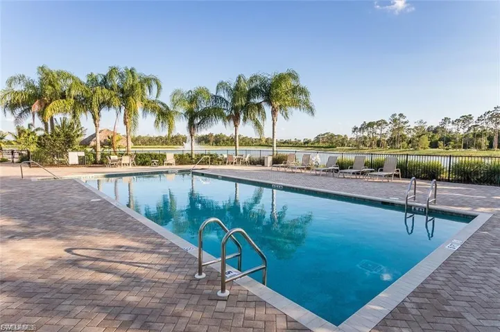 Community pool featuring a patio area