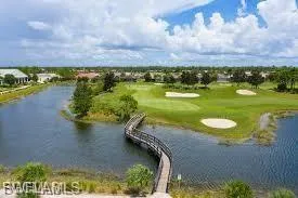 View of home's community featuring a water view and golf course view