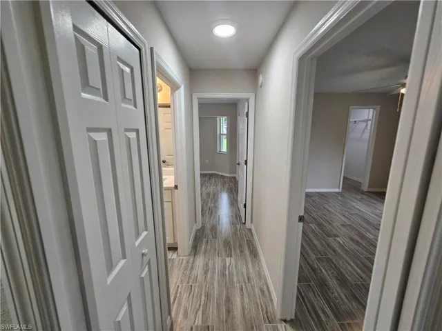 Hall featuring wood-type flooring
