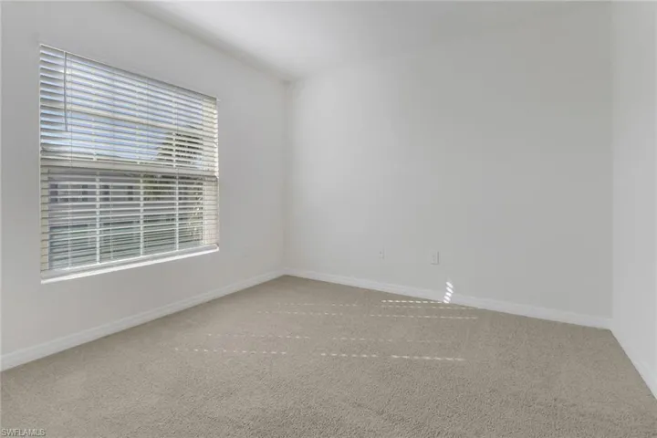 Spare room with carpet floors