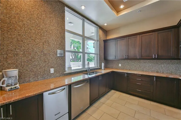 9115  Strada  PL, Naples, FL 34108