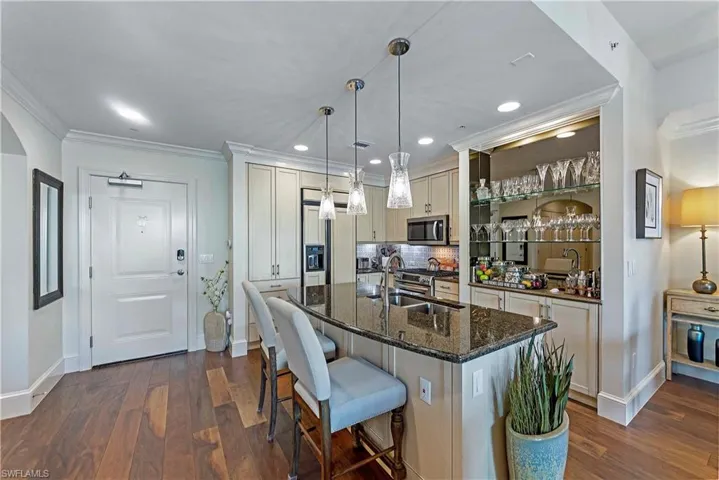 9115  Strada  PL, Naples, FL 34108