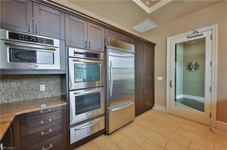 9115  Strada  PL, Naples, FL 34108