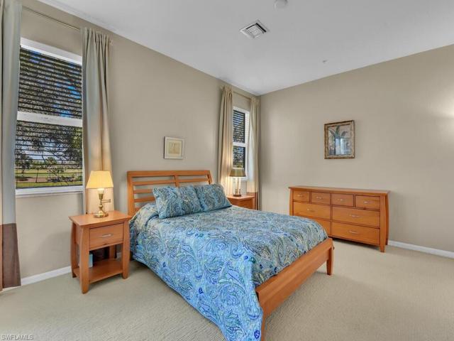 Large master bedroom with beautiful views.