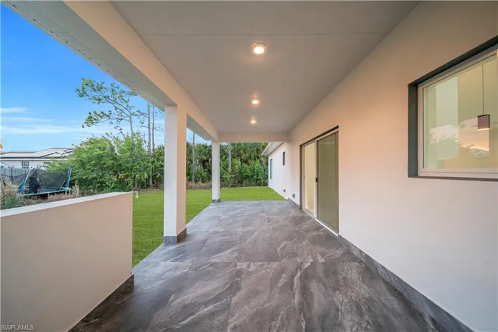 View of patio featuring a trampoline