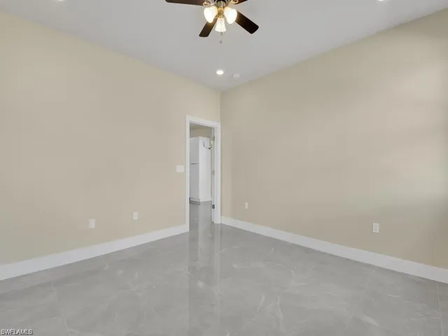 Spare room with ceiling fan and recessed lighting