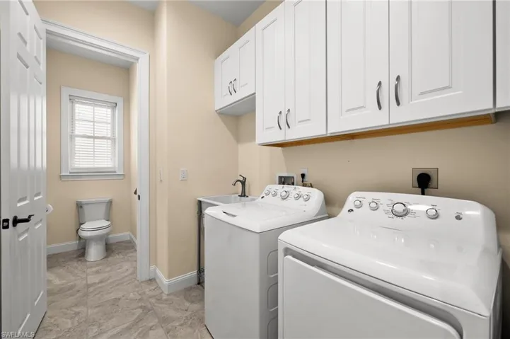 Laundry Room with Access to Master Bath