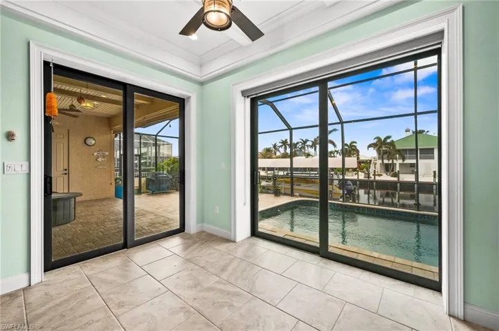 Dining Area with Sliders that Open to the Outdoor Living Space