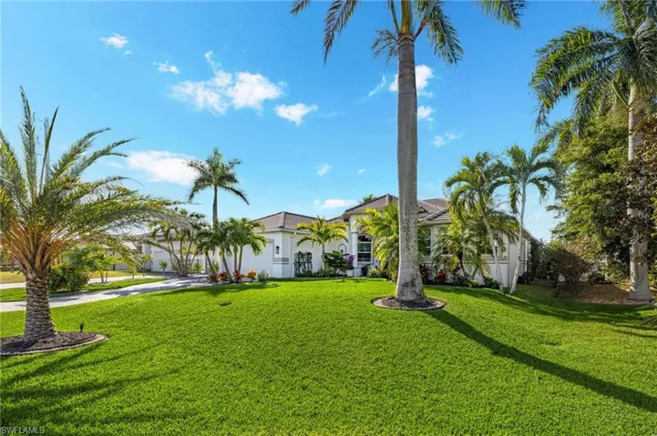 View of front of property with a front yard