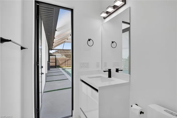 Rear Private Pool Bath that also accesses the Rear Bed 3 ensuite