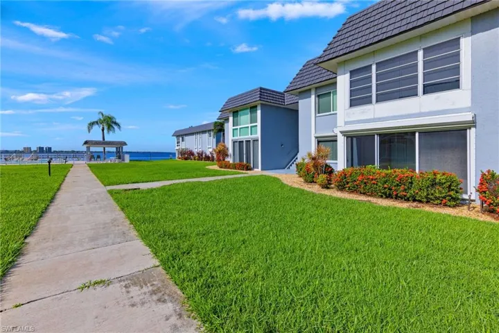 Common Area Walkway to pool and dock - Back of condo right handside