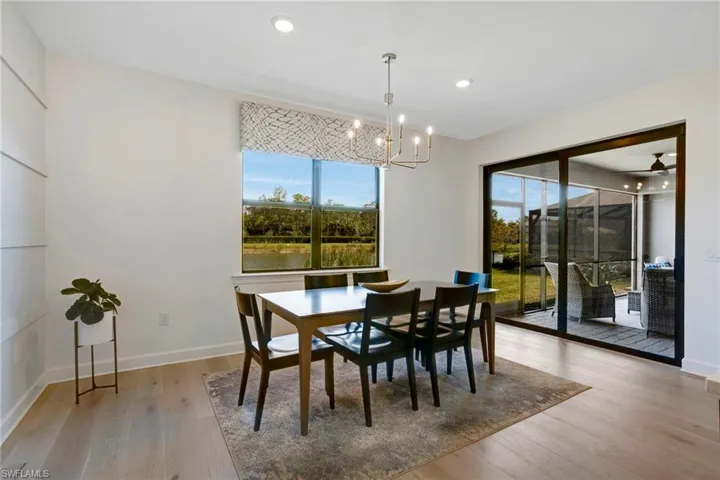 Eat in kitchen with a healthy amount of sunlight and views of the lake