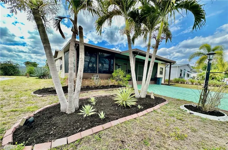 View from the south front corner of mulched gardens