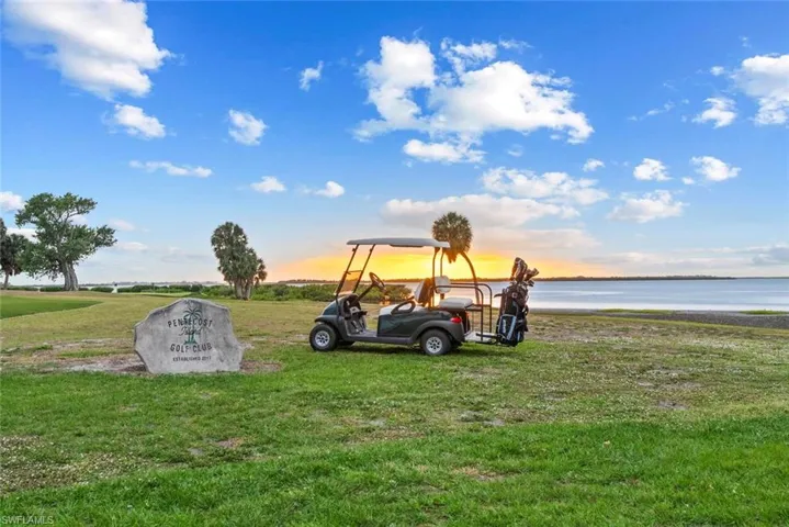 GOLF - The property has a 9 Hole Golf Course, offering expansive green spaces and waterfront views