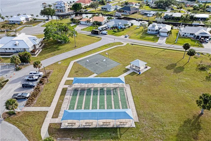 Aerial View of Shuffleboard Courts/Basketball Courtsfeaturing a large body of water