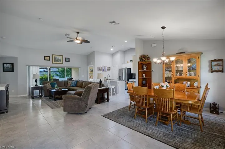 View of living room and dining room upon entering home