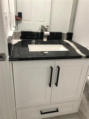Half bath featuring vanity