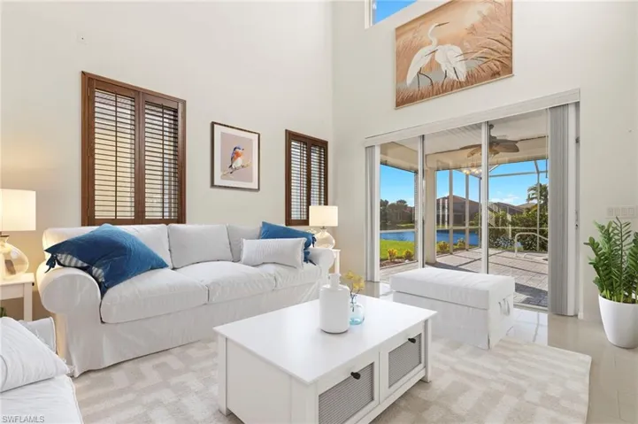 Living Room Virtually Staged. Sliders to pool deck