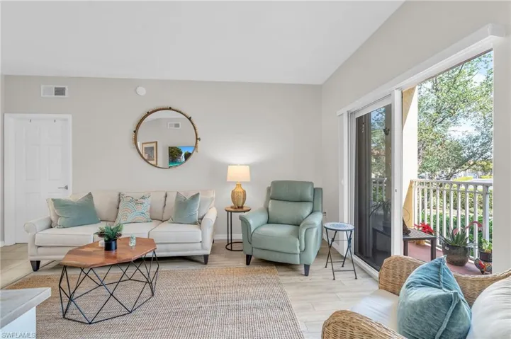 Living room with light wood-type flooring