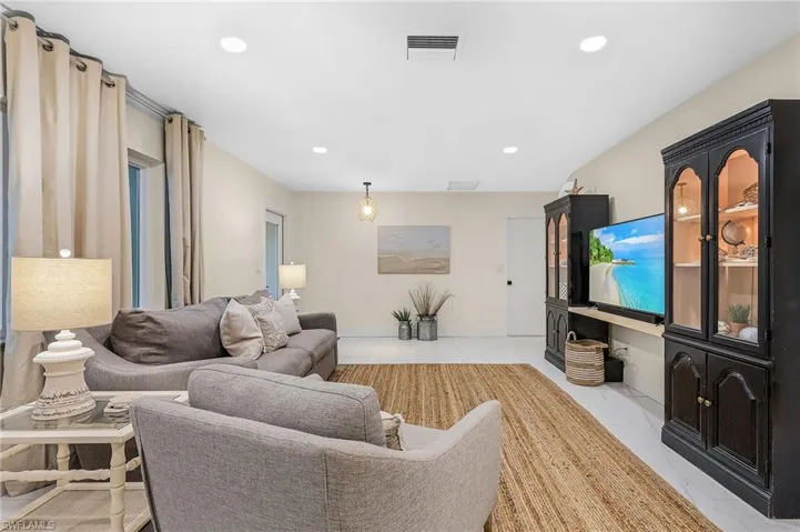 View of tiled living room
