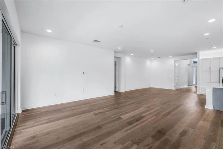 Unfurnished room featuring wood-type flooring