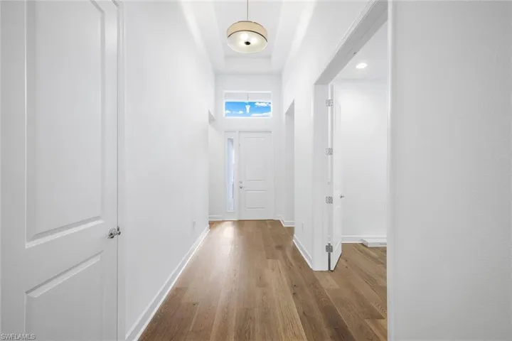 Corridor with wood-type flooring