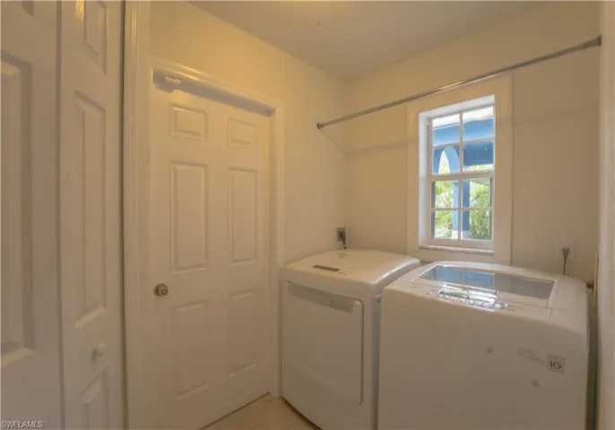 Laundry Room & entrance to 2-car garage