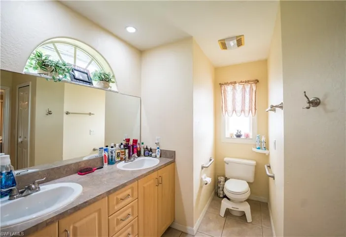 Master Bathroom with double sink vanity and 2 windows ~ Lots of natural light!